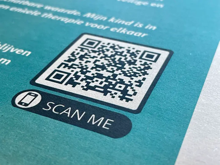 Scan me QR-code in a newspaper